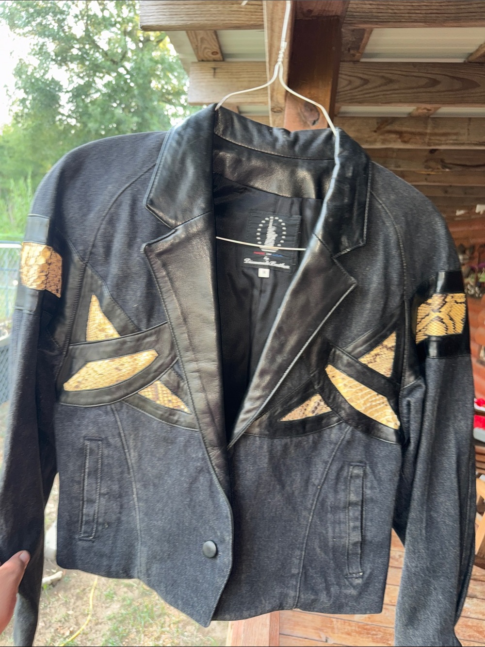 Black Denim and Leather Bomber Jacket with Snake-Print Accents